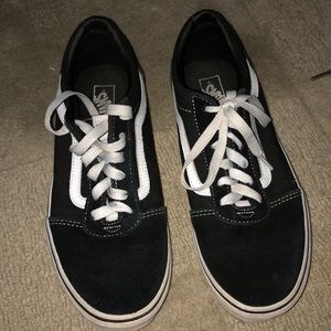 Black Vans.